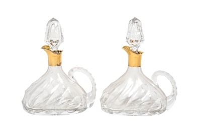 Lot 2283 - A Pair of Continental Silver-Gilt Mounted Cut-Glass Decanters