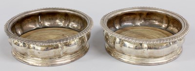 Lot 15 - A Pair of George IV Silver Wine-Coasters,...