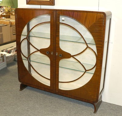 Lot 1338 - An Art Deco Display Cabinet, of stylised form...