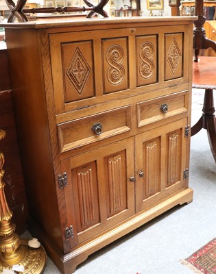 Lot 1318 - A Carved Oak Cocktail Cabinet, in the Jacobean...