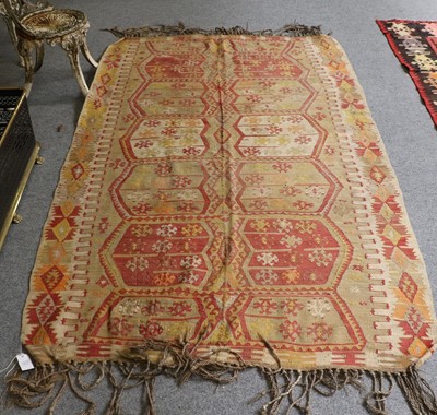 Lot 1217 - Anatolian Kilim, woven in two parts, the field...