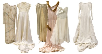 Lot 2047 - 20th Century Wedding Dresses comprising a pink...