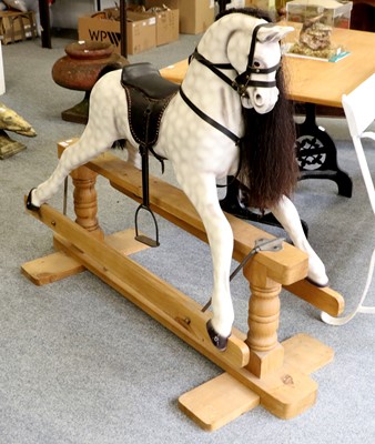 Lot 1189 - A Modern Dapple Grey Rocking Horse, on pine...