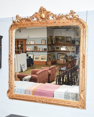 Lot 1216 - A Large Gilt Overmantle Mirror, foliate swag...