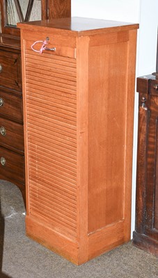 Lot 1232 - A 20th Century Oak Tambour-Front Tall Cabinet,...