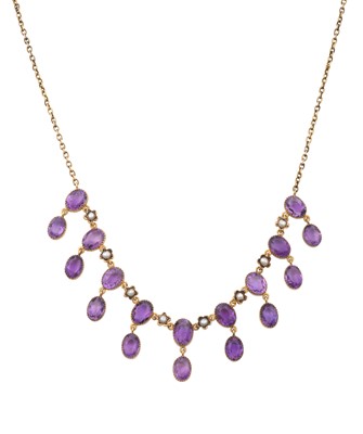 Lot 2176 - An Edwardian Amethyst and Split Pearl Necklace...