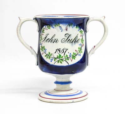 Lot 67 - A Documentary Pearlware Loving Cup, dated 1857,...