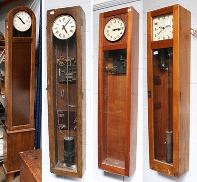 Lot 1300 - Four Electric Master Clocks, signed Smiths,...