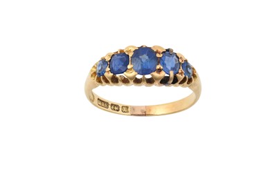 Lot 2163 - A Sapphire Five Stone Ring the graduated oval...