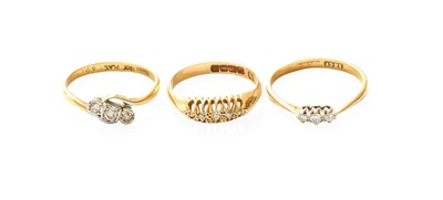 Lot 313 - An 18 Carat Gold Diamond Five Stone Ring,...