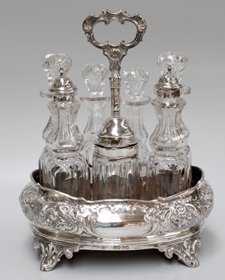 Lot 12 - A Victorian Silver Seven-Bottle Cruet, by...