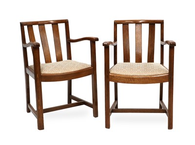 Lot 187 - A Pair of Heal's Oak Armchairs, rounded top...