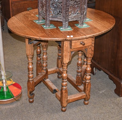 Lot 1284 - A Light Oak Gate Leg Table, of small...