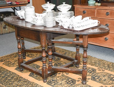 Lot 1257 - An 18th Century Style Oak Gateleg Table, oval...