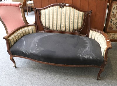 Lot 1345 - A Late Victorian Carved Mahogany Sofa, part...