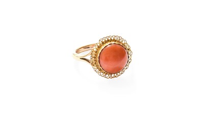 Lot 326 - A Coral Ring, the round cabochon coral in a...