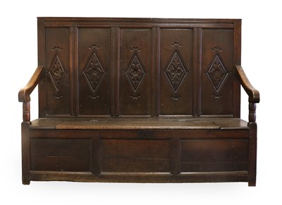 Lot 609 - A George II Joined Oak Box Settle, 2nd quarter...