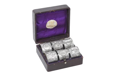 Lot 2322 - A Cased Set of Six Victorian Silver Napkin-Rings