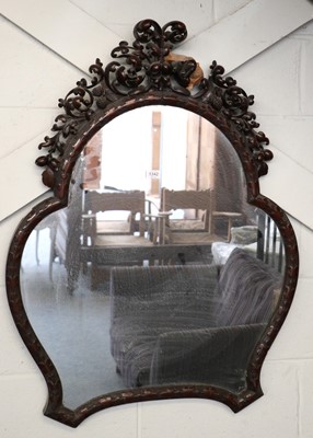 Lot 1342 - A Trefoil Hanging Mirror, in carved mahogany...