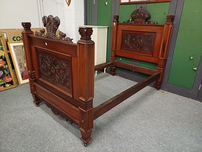 Lot 1279 - A Carved Mahogany Three Quarter Bedstead, with...