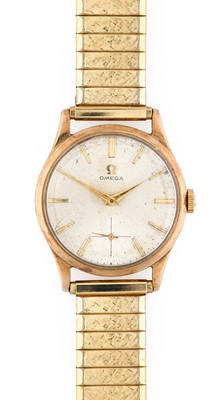 Lot 2402 - Omega: A 9 Carat Gold Wristwatch, signed Omega,...