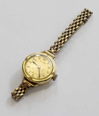 Lot 313 - A Lady's 18 Carat Gold Wristwatach, signed...