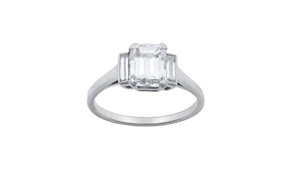 Lot 2277 - A Diamond Three Stone Ring an emerald-cut...