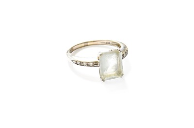 Lot 320 - An Aquamarine Ring, the emerald-cut aquamarine...