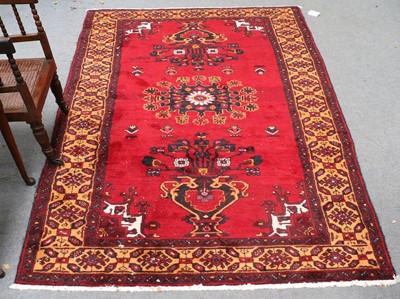 Lot 1208 - Luri Rug, the aubergine field centred by a...