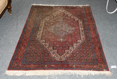 Lot 1180 - Iranian Rug of Senneh Design, the field with...