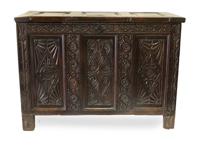 Lot 1283 - A Joined Oak Chest, the hinged lid with three...