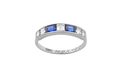 Lot 2311 - A Sapphire and Diamond Half Hoop Ring five...