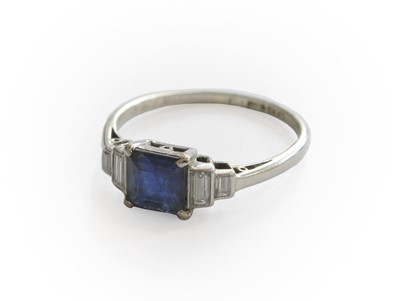 Lot 262 - A Sapphire and Diamond Ring, the square...