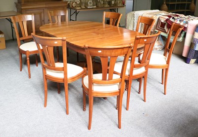 Lot 1204 - A Modern Cherrywood Dining Suite Comprising: a...