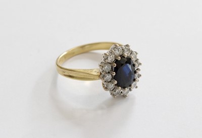 Lot 208 - An 18 Carat Gold Sapphire and Diamond Cluster...