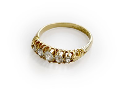 Lot 265 - An 18 Carat Gold Diamond Five Stone Ring, the...