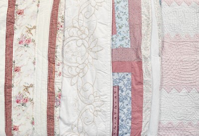 Lot 1095 - Four 20th Century Quilts comprising a pink and...