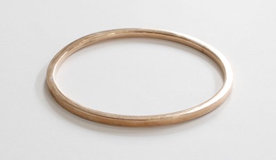 Lot 246 - A Bangle, stamped '9CT', diameter 8.4cm