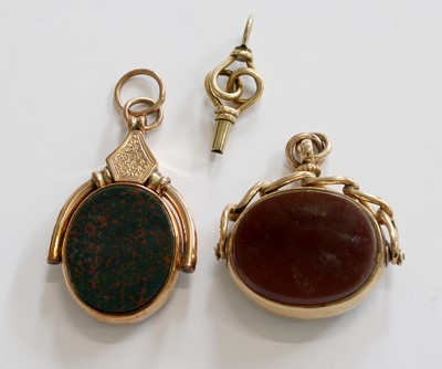 Lot 258 - A 9 Carat Gold Hardstone Swivel Fob, measures...