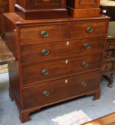 Lot 1275 - A Georgian Oak Straight-Front Chest of Four...