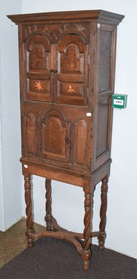 Lot 1296 - An 18th Century Oak Side Cabinet, on later...