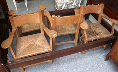 Lot 1233 - A Set of Four Light Oak Country Arm Chairs,...