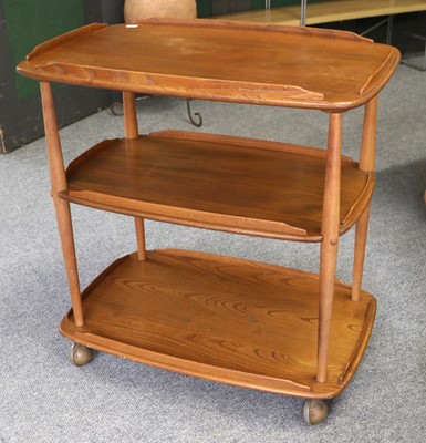 Lot 1188 - An Ercol Three Tier Tea Trolley, 71cm by 46cm...