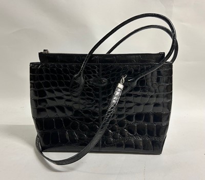 Lot 1033 - Tods Black Patent Leather Crocodile Look...