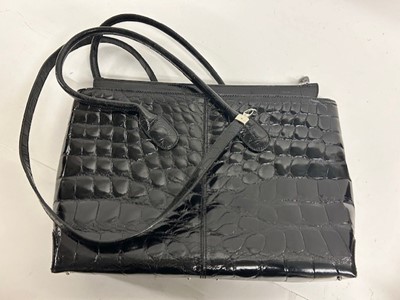 Lot 1033 - Tods Black Patent Leather Crocodile Look...