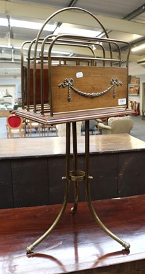 Lot 1161 - A Brass and Mahogany Pedestal Magazine Rack,...