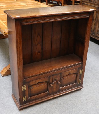 Lot 1170 - A Reproduction Oak Open Bookcase, with two...