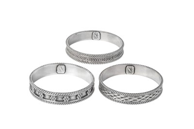 Lot 2336 - Three George V Silver Napkin-Rings