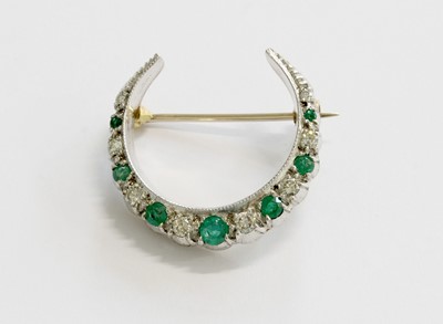 Lot 223 - A 9 Carat Gold Emerald and Diamond Crescent...