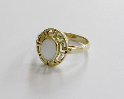 Lot 259 - An Opal Ring, the oval cabochon opal in a...